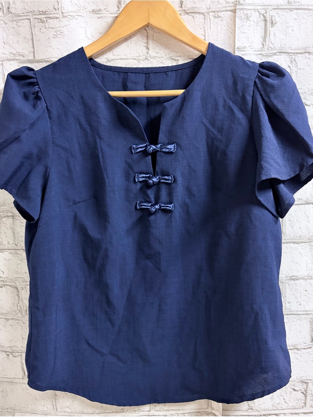 Women’s Navy Short Sleeve Blouse with Decorative Knot Closures